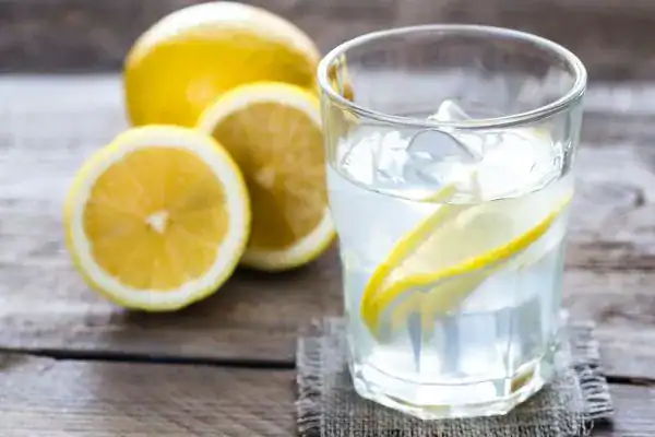 Hydration: The Secret Ingredient for a Toned Stomach and Enhanced Fitness 2 Image of lemon water to aid hydration East Grinstead